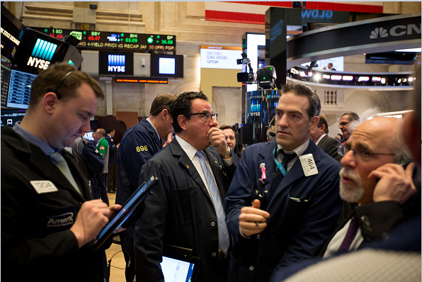 Corredores de bolsa en Wall Street.