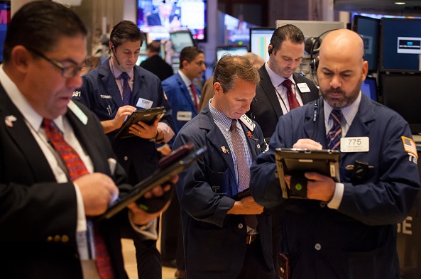 Corredores de bolsa en Wall Street.