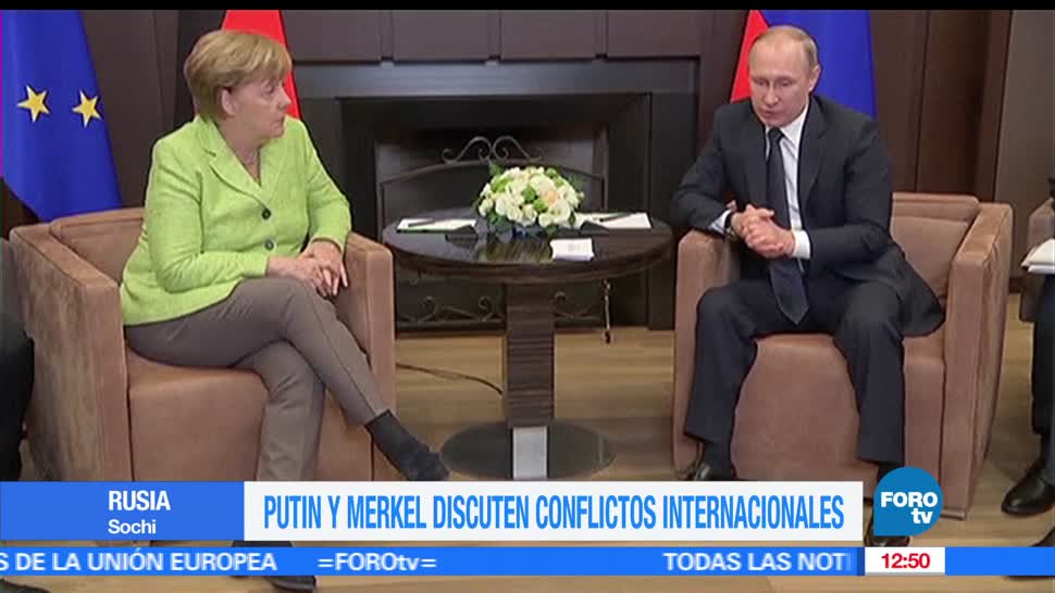 Putin, Merkel, conflictos internacionales, Siria y Ucrania