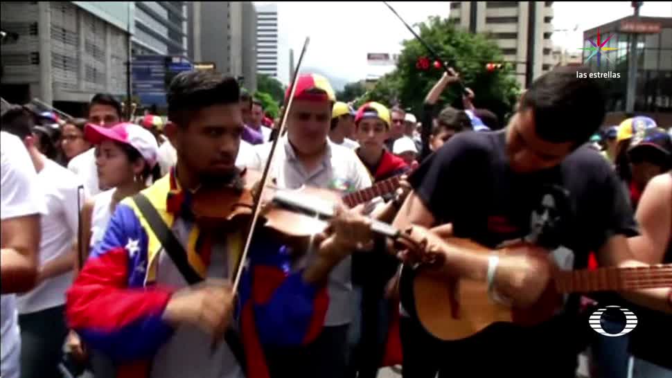 noticias, televisa news, Músicos y artistas, marcha, Maduro, venezuela