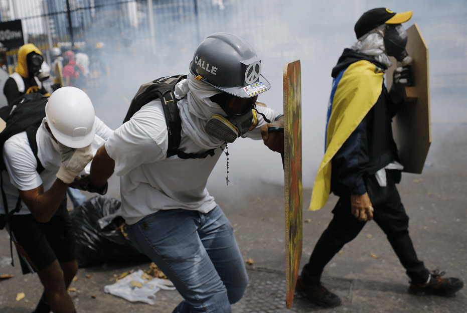 Manifestantes venezolanos durante marcha contra Maduro