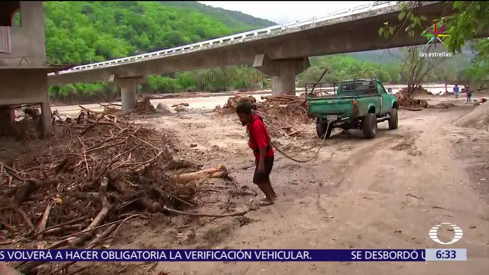 daños en 26 carreteras, carreteras de Oaxaca, tormenta tropical, Calvin, tierra