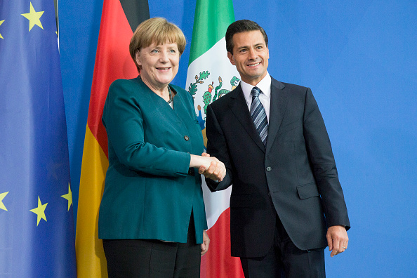 Angela Merkel y Enrique Pena participan en conferencia