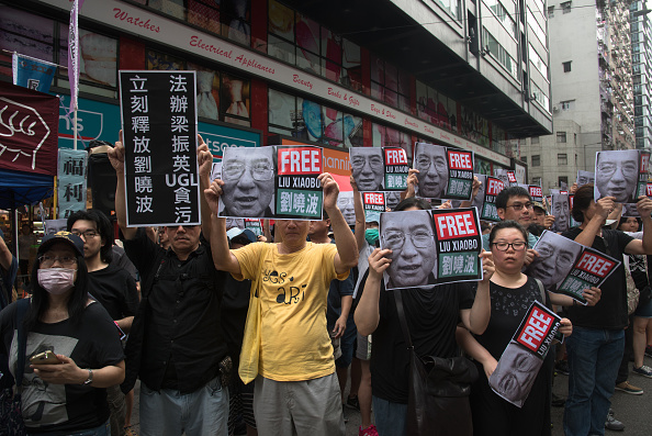 Manifestante, libro de condolencias, muerte, Nobel de la Paz, Liu Xiaobo