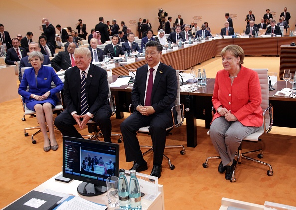 Theresa May, Donald Trump, Xi Jinping y Angela Merkel