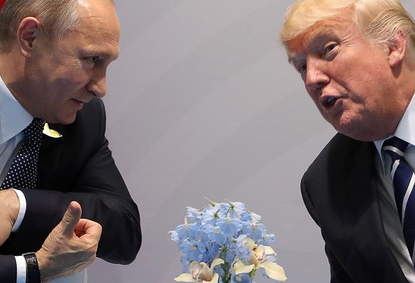 Vladimir Putin, presidente de Rusia, y Donald Trump, presidente de EU