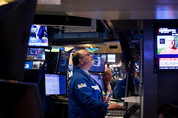 Wall Street cierra ganancias y Dow Jones baja