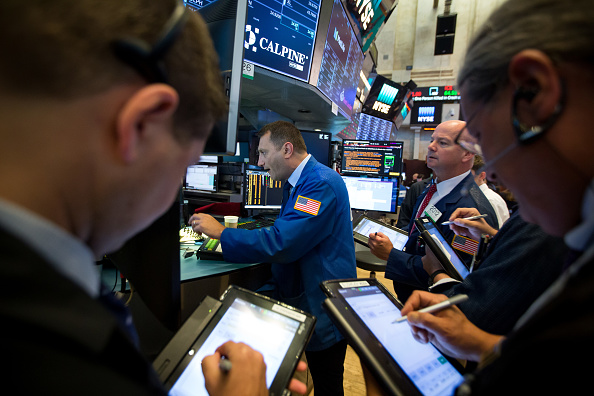 Wall Street cierra ganancias y tres nuevos récords