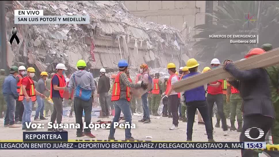Rescatistas Buscan Joven Atrapado Edificio SLP Medellín