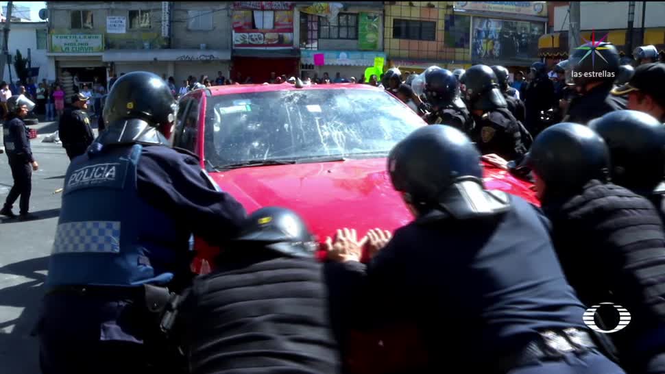 Automovilista se lanza contra manifestantes en la CDMX