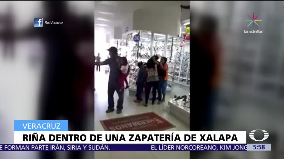 Mujeres protagonizan una riña en zapatería de Xalapa