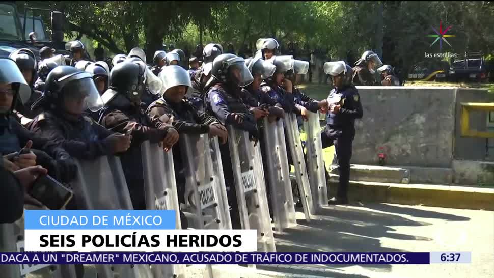Seis policías CDMX resultan heridos por petardos de manifestantes
