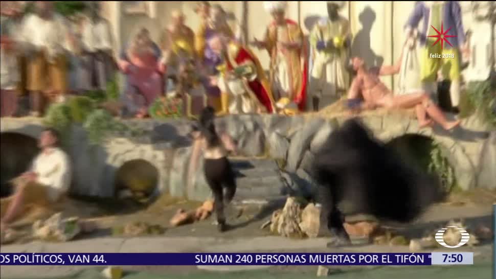 Mujer topless intenta robar figura del niño Jesús en el Vaticano