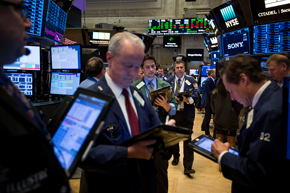 Wall Street cierra pérdidas y Dow Jones cede ciento