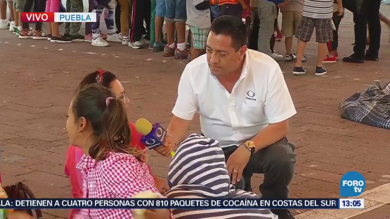 Dan atención médica a niños de caravana migrante en Puebla