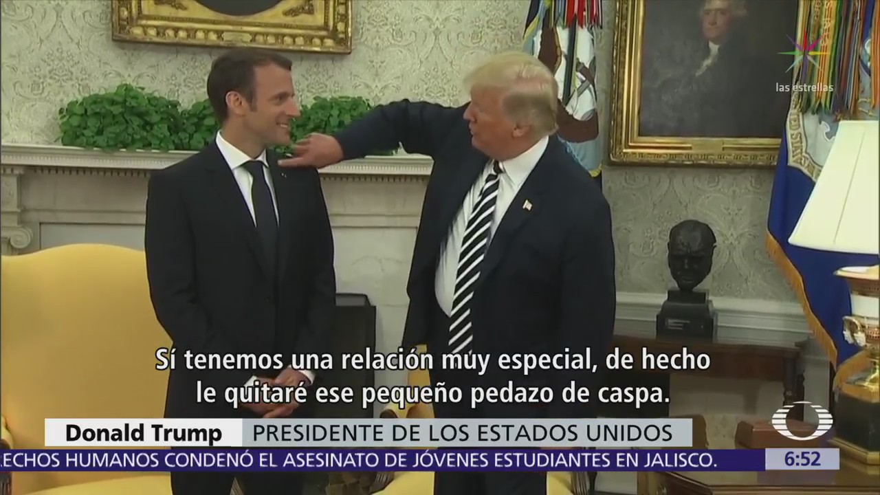 Trump dice que le quita caspa a Emmanuel Macron frente a reporteros