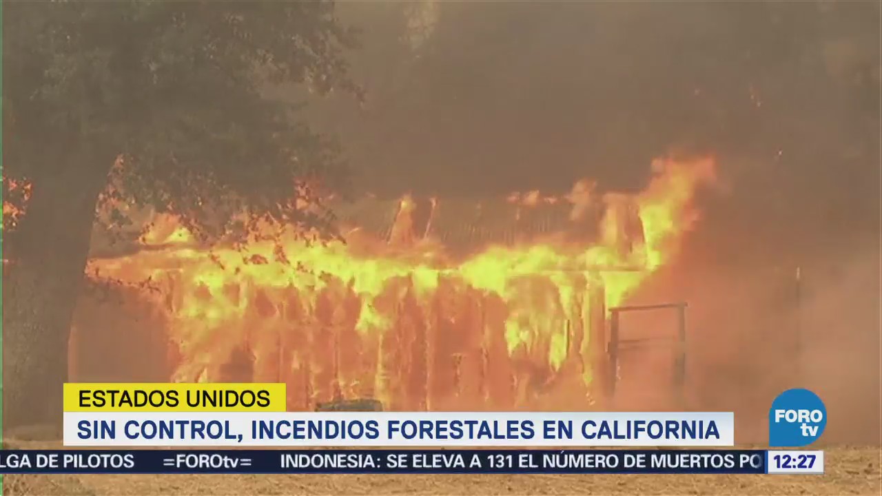 Siguen sin control los incendios forestales en California