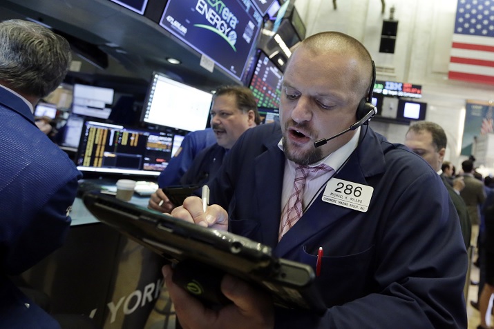 Wall Street cierra con ganancias y dos récords