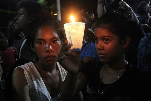 Caravana migrante rinde homenaje a compañero que murió en Huehuetán, Chiapas