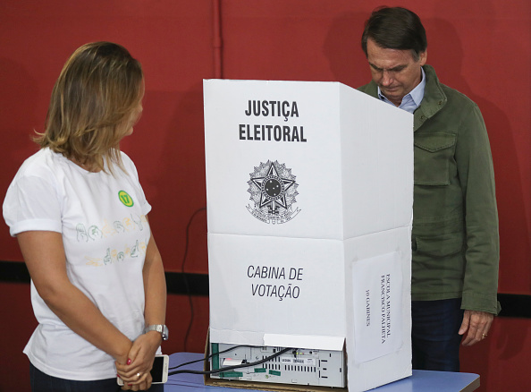 Presidente de Brasil y candidatos presidenciales votan