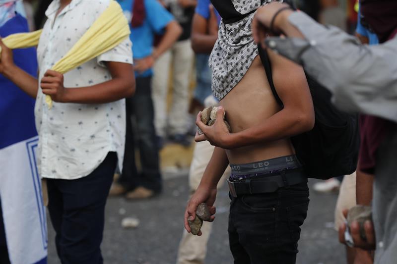 México intercambia información para detener a migrantes centroamericanos armados