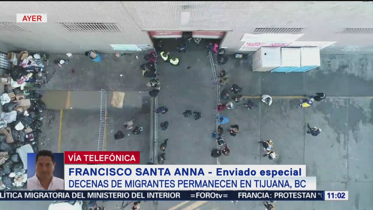 Buscan desalojar bodega ocupada por migrantes en Tijuana