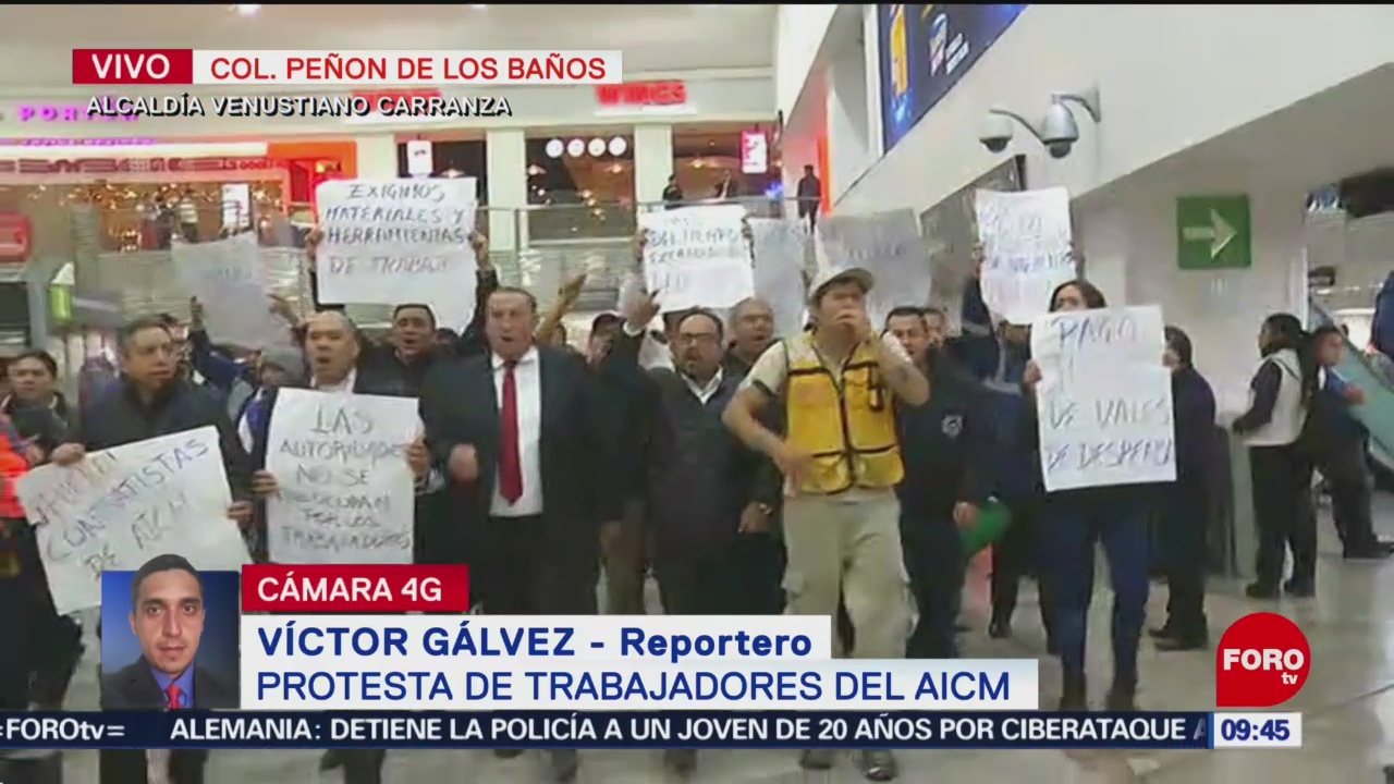 Protestan trabajadores al interior de Terminal 1 del AICM