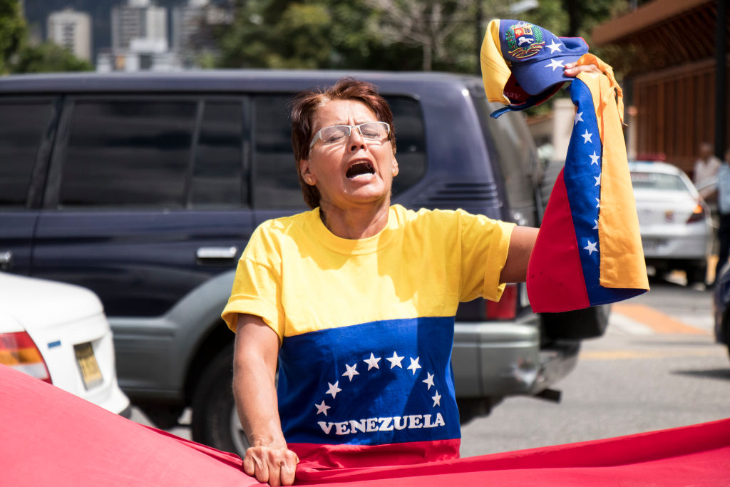 Foto: Una mujer venezolana protestas contra Nicolás Maduro en las calles de Caracas el 30 de enero del 2019