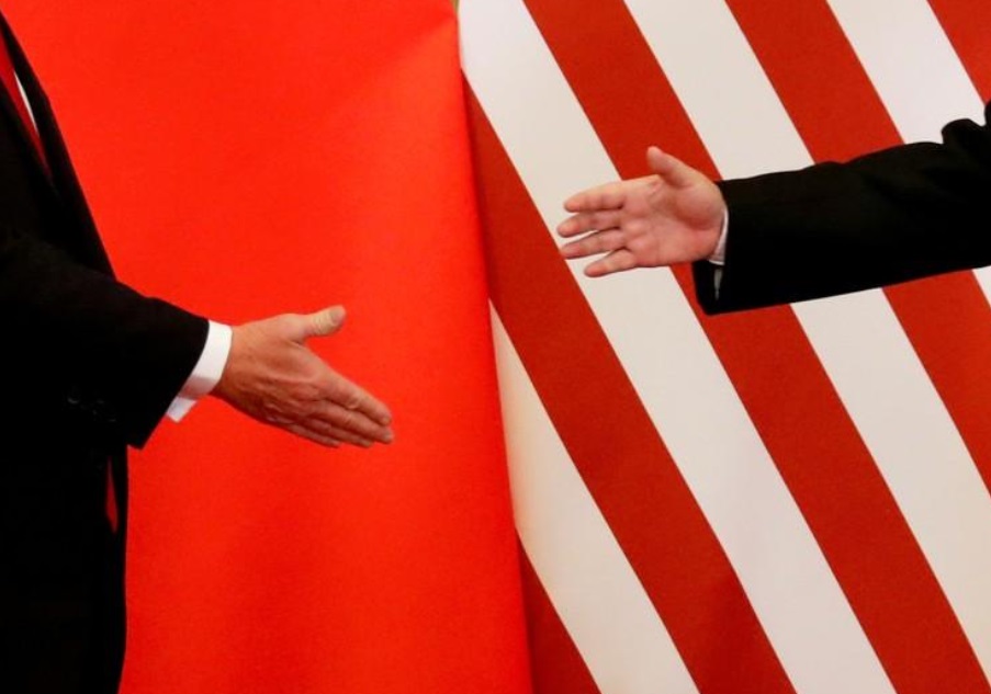 Foto: Donald Trump y Xi Jinping se dieron la mano en un comunicado conjunto en China el 9 de noviembre de 2017 (Reuters)