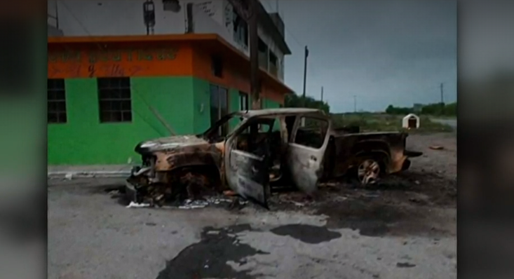 Foto: Vehículo incendiado tras violencia en Tamaulipas, 24 de marzo de 2019, México