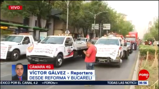 Conductores de grúas bloquean Paseo de la Reforma, CDMX