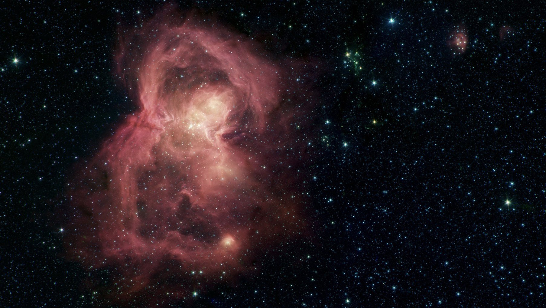 La imagen de la nebulosa W40 que parece una 'mariposa roja espacial' difundida por el Laboratorio de Propulsíón a Chorro de la NASA, ubicado en California (Twitter/@NASAspitzer)
