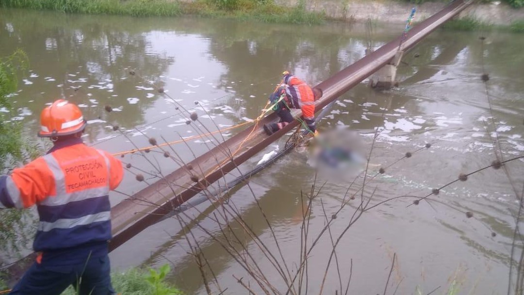 Foto: Rescatan cuerpo de hombre en canal de Puebla, 26 de julio de 2019