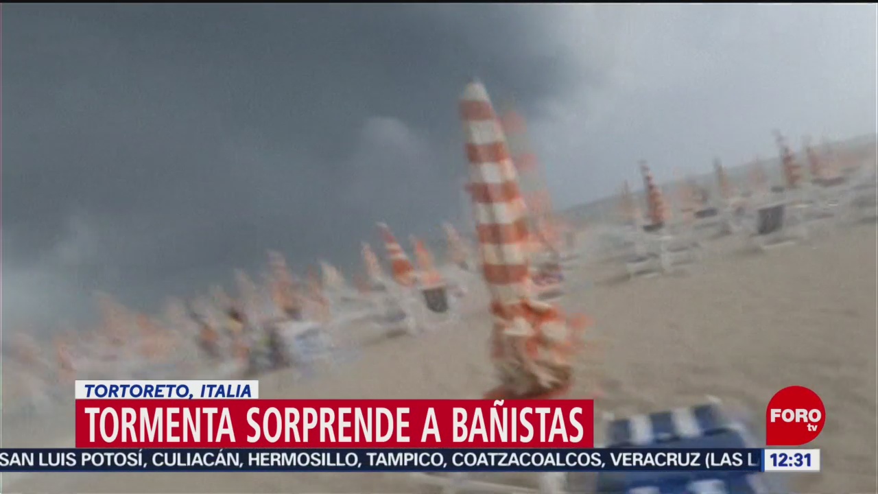 Tormenta sorprende a turistas en playa de Tortoreto, Italia
