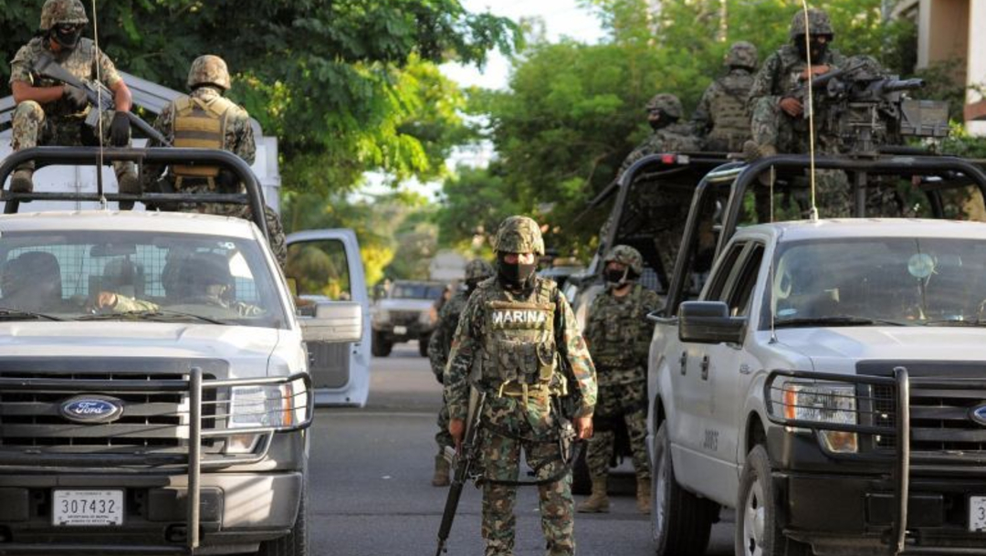 Marina detiene a 14 integrantes de banda criminal de Michoacán: AMLO