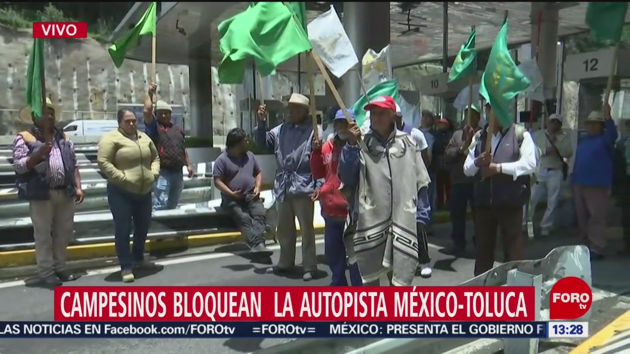 FOTO: Se enfrentan manifestantes autopista México-Toluca