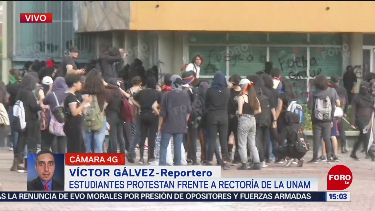 FOTO: Encapuchados realizan actos vandálicos Rectoría UNAM