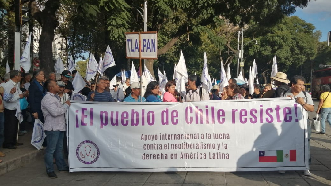 Realizan marcha por Reforma en apoyo a Chile