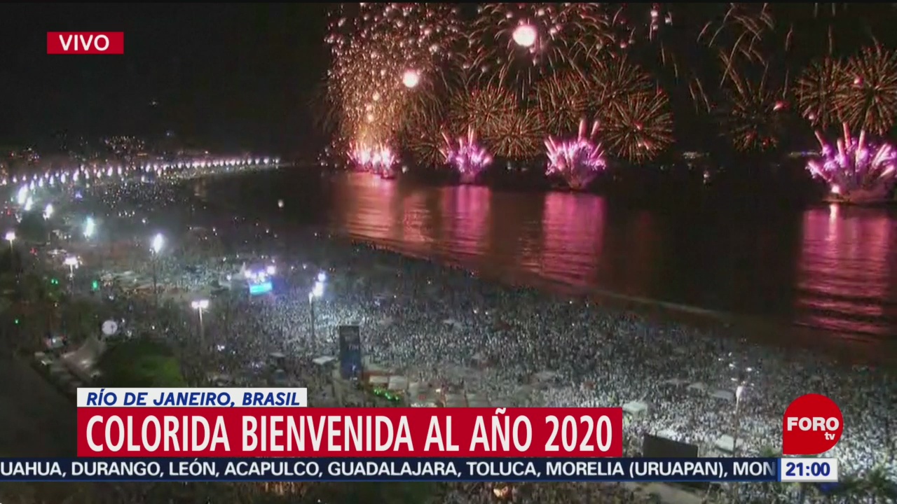 FOTO: 31 diciembre 2019, miles reciben el ano nuevo en la playa brasilena de copacabana