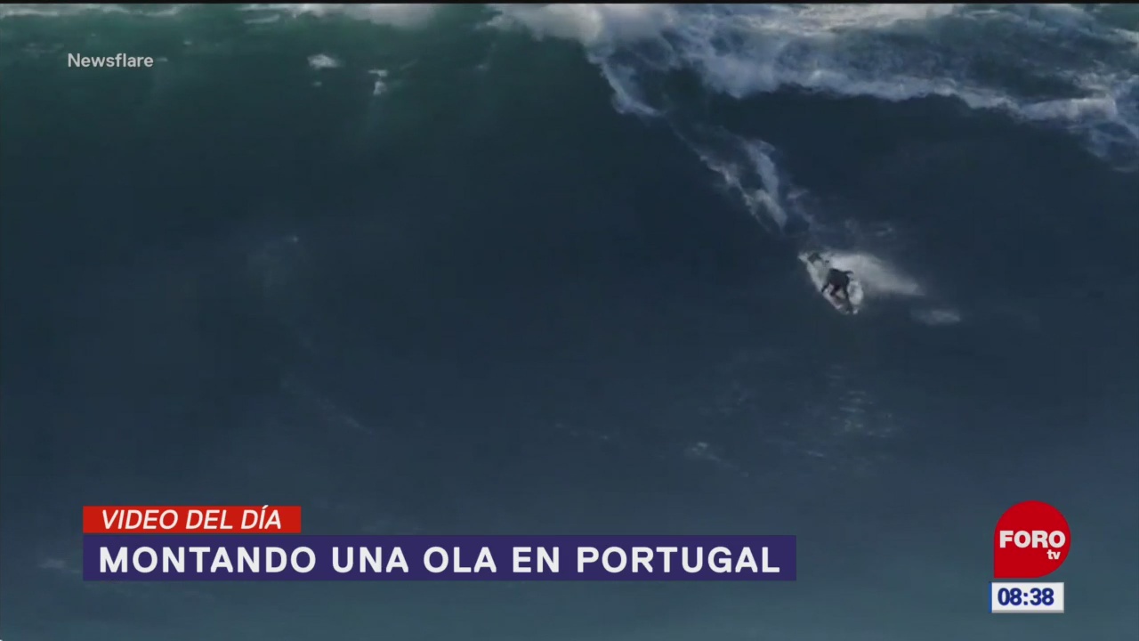 elvideodeldia montando una ola en portugal