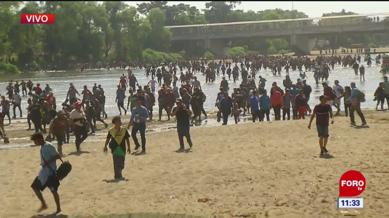 migrantes intentan cruzar el rio suchiate