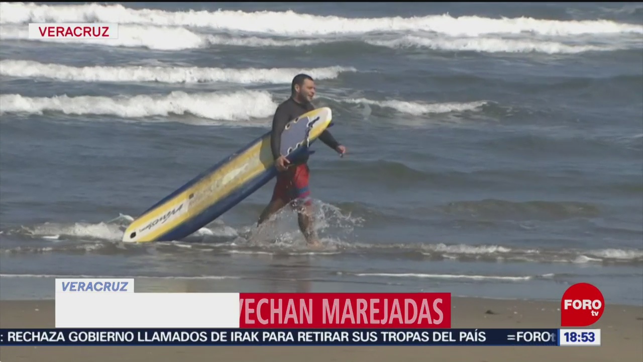 FOTO: surfistas aprovechan oleaje elevado en veracruz