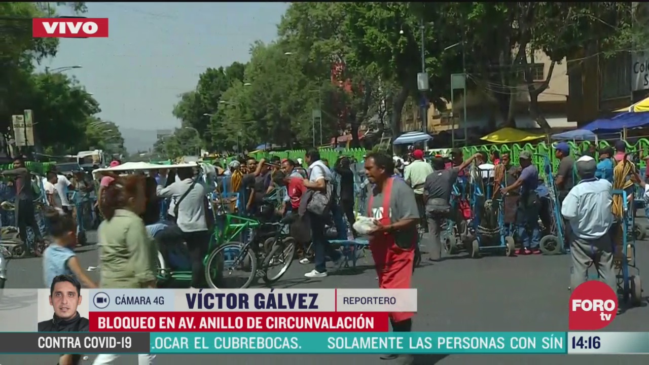 FOTO: comerciantes bloquean avenida anillo circunvalacion en cdmx