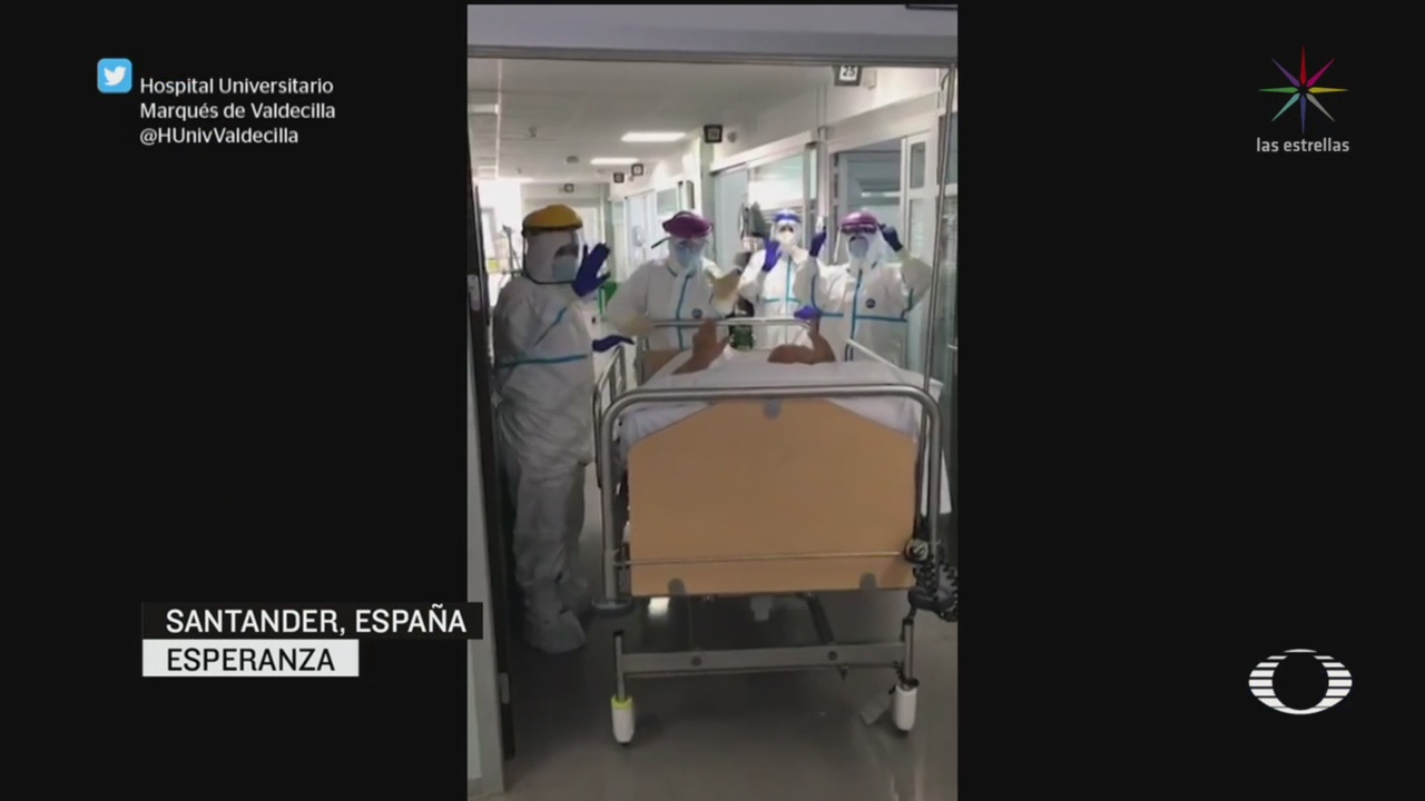 Foto: Coronavirus Médicos España Celebran Salida Paciente Covid19 25 Marzo 2020