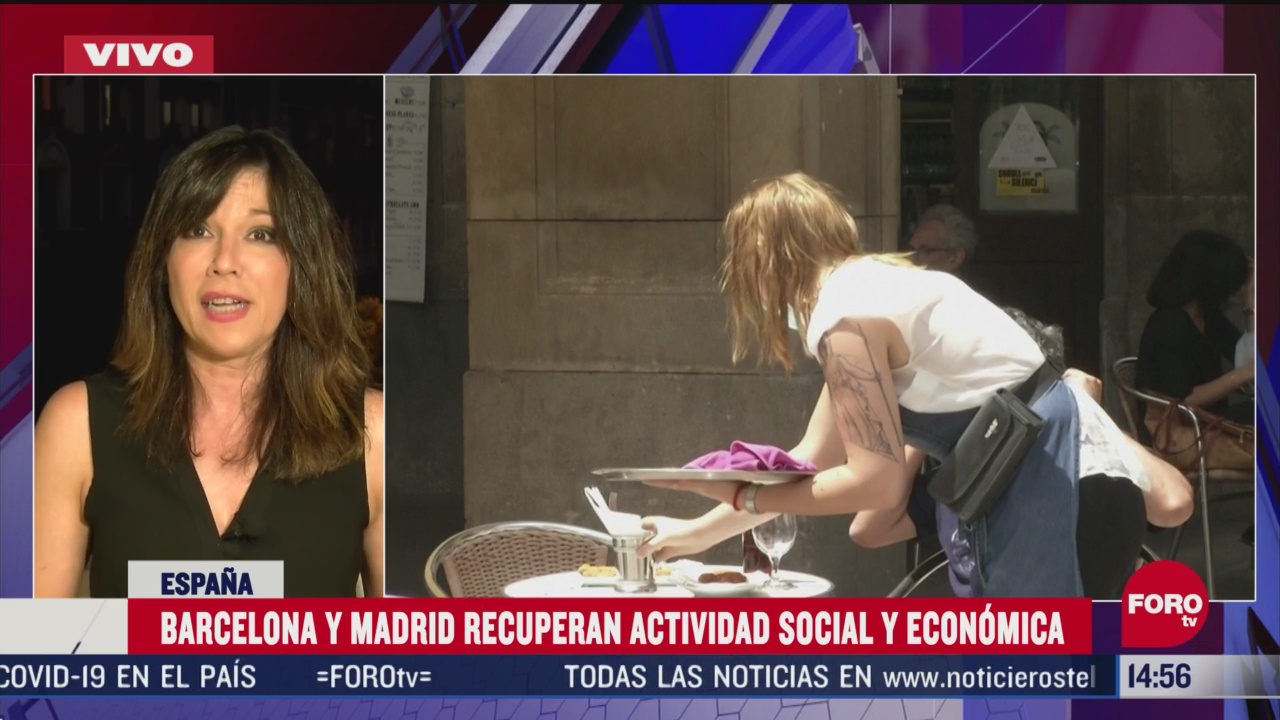 FOTO: barcelona y madrid recuperan actividades social y economica