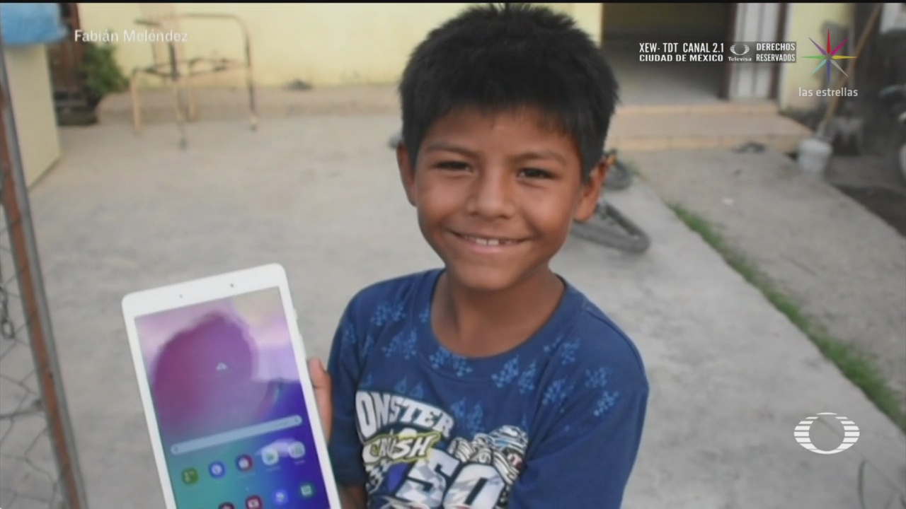 iker nino que hace mandados por 5 pesos recibe tableta para sus clases en linea