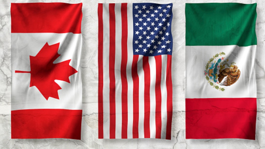 Banderas de Canadá, Estados Unidos y Canadá. Getty Images