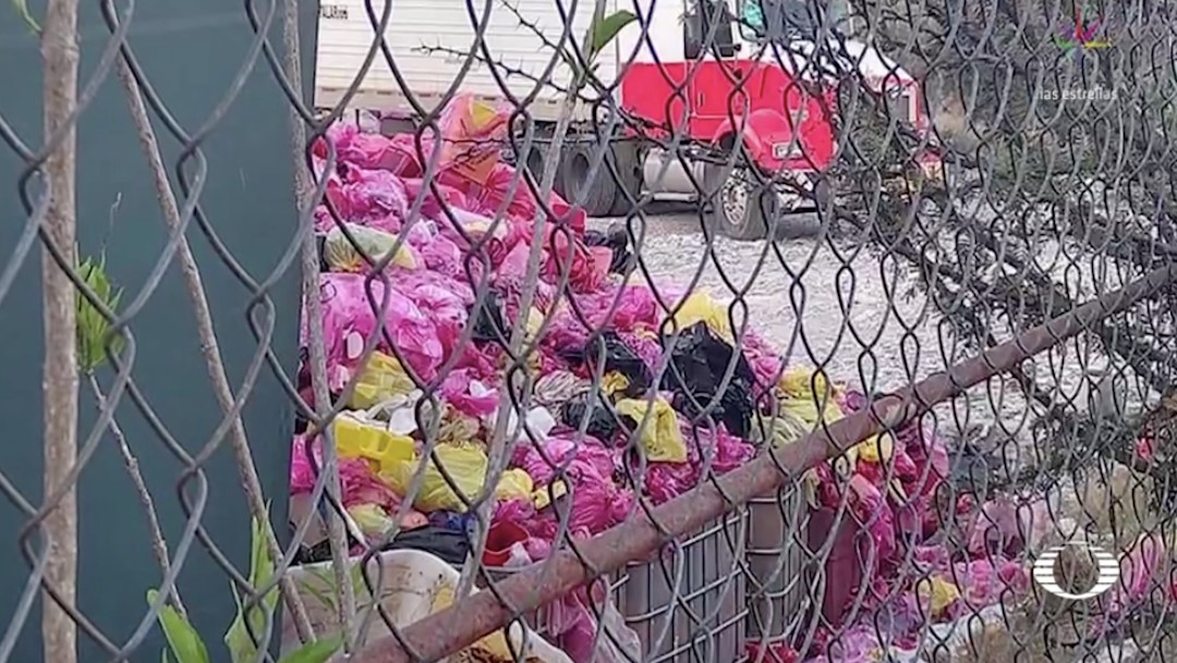 Denuncian tiradero irregular de basura COVID en Puebla