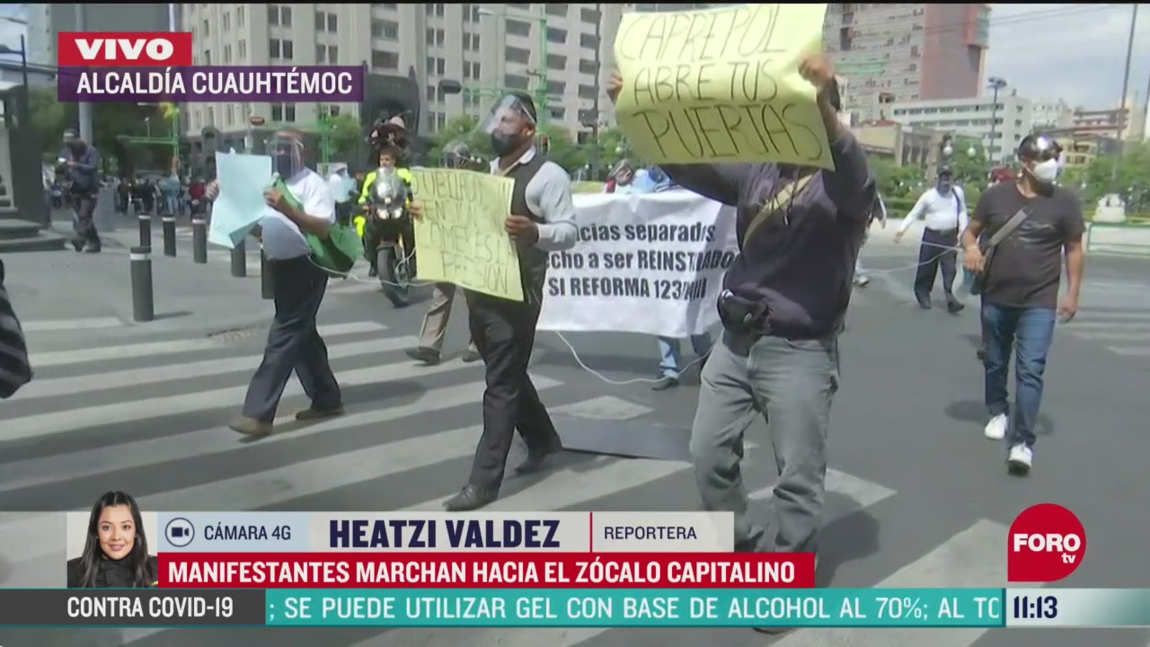Manifestantes marchan hacia el Zócalo de la CDMX