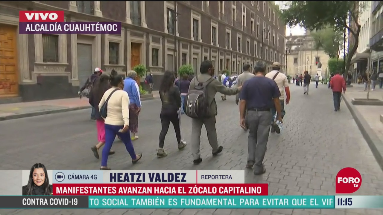manifestantes avanzan hacia el zocalo de la ciudad de mexico
